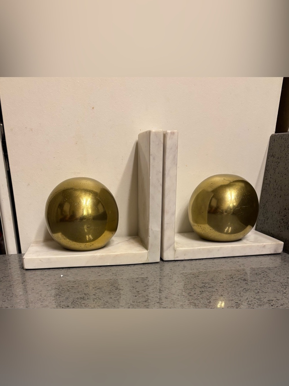Cosmopolitan Marble Modern
Decorative Bookends with Metallic Gold Balls.